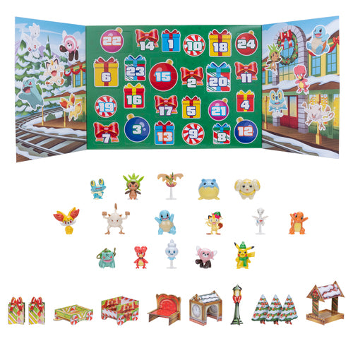 Pokémon-adventskalender åbnet med figurer og juletilbehør foran kalenderen